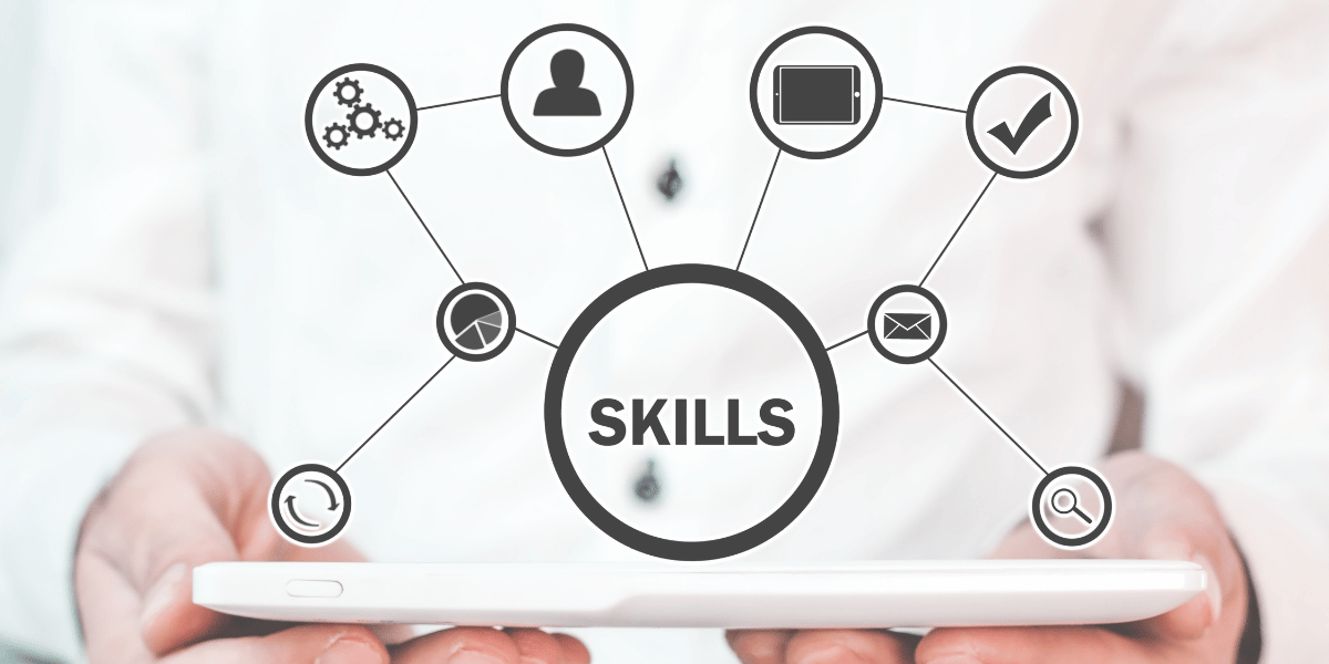 A hand holding a tablet projecting the concept of business skills needed for a successful career in real estate.