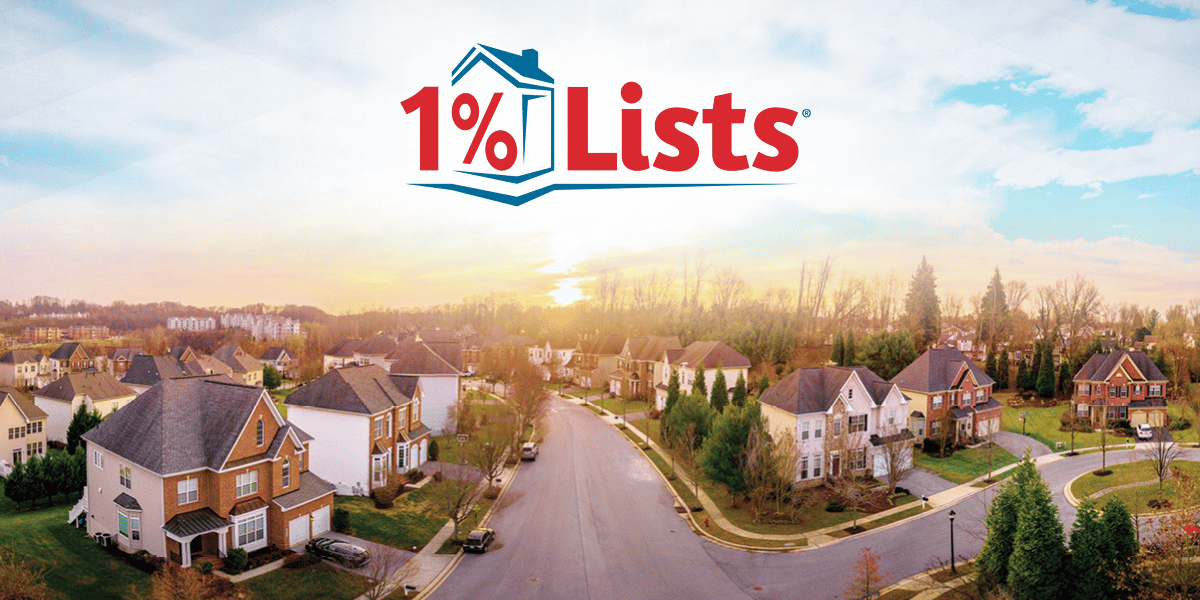 An aerial view of a neighborhood of beautiful homes, with the 1 Percent Lists logo