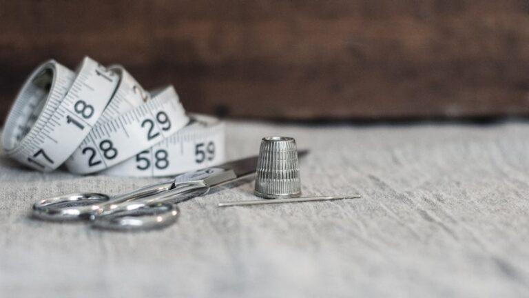 Close-up of neat stacks of cash next to house keys on a bright, minimalist surface, symbolizing significant savings in a r...