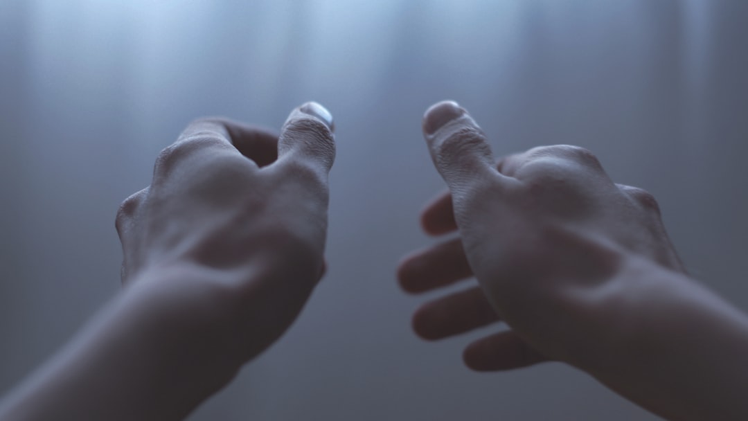 A close-up of a business handshake where one person has their fingers crossed behind their back, illustrating the hidden misalignment in the traditional realtor-client relationship.