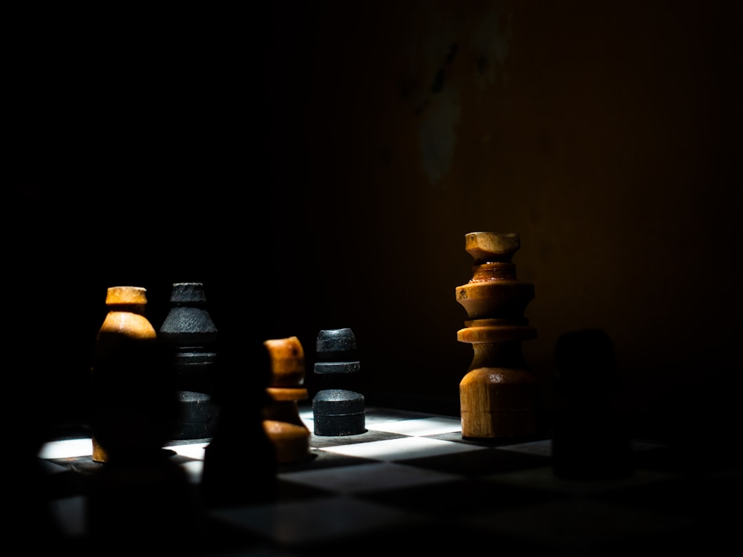 Minimalist photo of a single chess piece strategically positioned to win a game, symbolizing a clear advantage in a negoti...